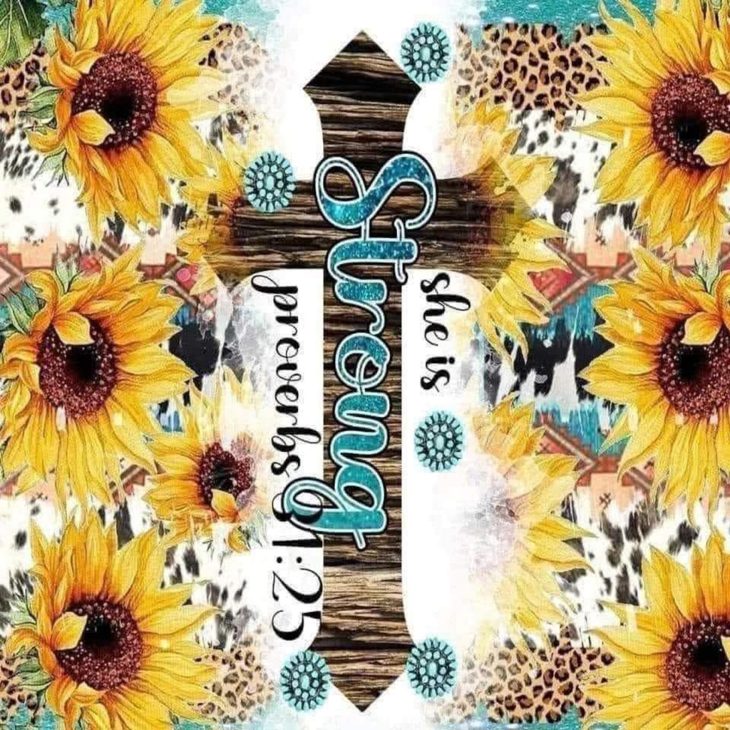A square fabric or print design featuring a central white cross with turquoise and black lettering that reads 'She is strong through prophets 1:25', surrounded by a busy collage of yellow sunflowers, leopard print, wood texture, and turquoise decorative motifs.