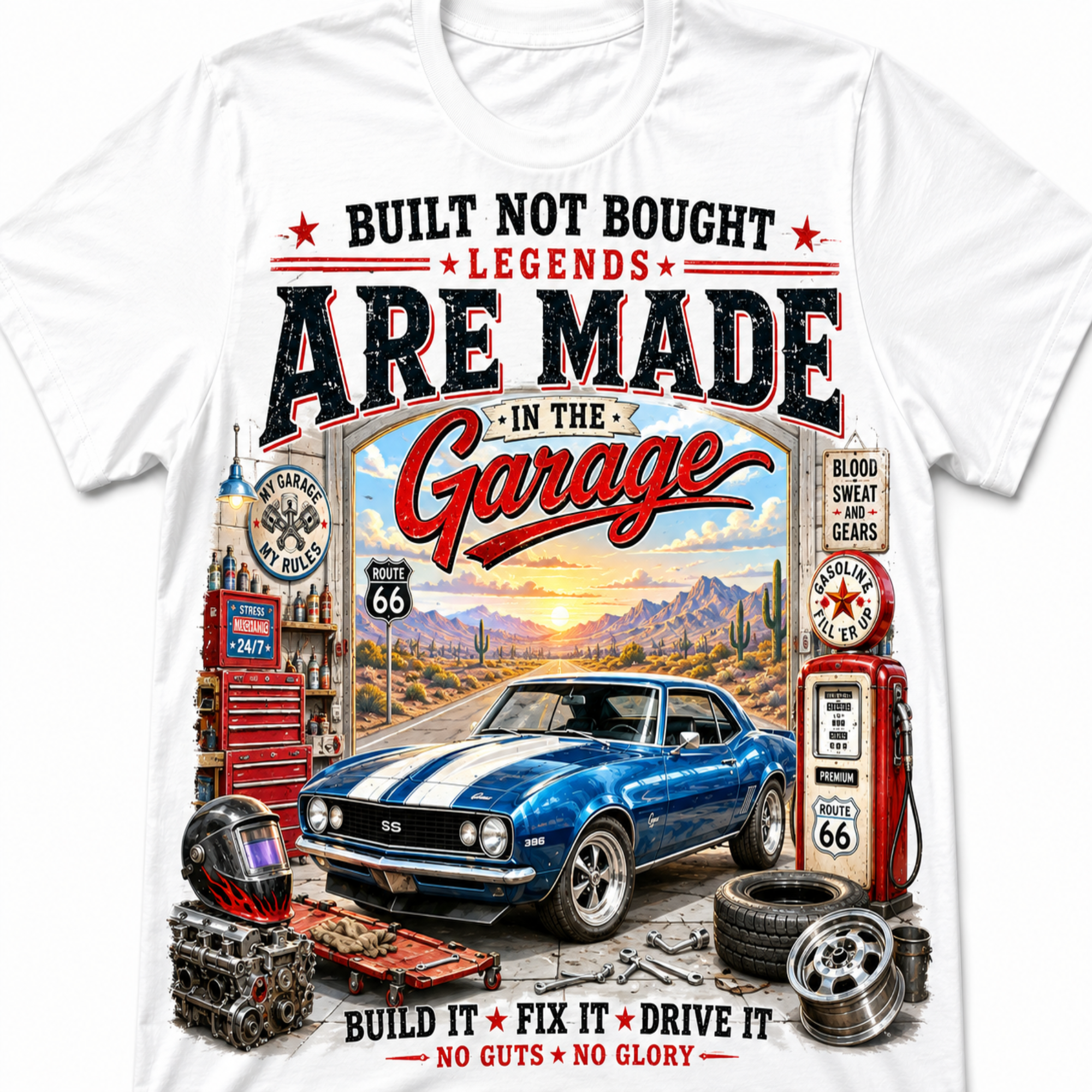 A white short-sleeve crewneck t-shirt featuring a large, detailed vintage-style graphic print on the front. The graphic depicts a blue muscle car with white stripes, a red vintage gas pump, a red tool chest, a helmet, and desert scenery under a sunset sky, with bold text reading 'BUILT NOT BOUGHT LEGENDS ARE MADE IN THE Garage'.