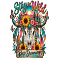A colorful graphic design featuring a decorated skull with feathers, sunflowers, butterflies, cacti, and the words “Stay Wild” at the top and “Keep Dreaming” at the bottom, shown on a white background.