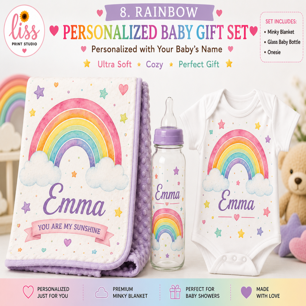 Personalized baby shower gift set featuring a pink and purple plush blanket, a clear glass baby bottle, and a white onesie, all printed with a colorful rainbow and the name 'Emma'.