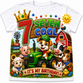 A white short-sleeve crewneck t-shirt featuring a colorful cartoon graphic on the front. The graphic reads '7 SEVEN COOL' with a gold crown, a green tractor, a pig, a cow, a horse, a sheep, a chicken, and a banner that says 'IT'S MY BIRTHDAY!'.