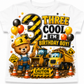 A white short-sleeve baby t-shirt featuring a colorful cartoon graphic for a three-year-old boy's birthday. The graphic includes a teddy bear in a yellow hard hat and tool belt, a yellow construction truck, a yellow bulldozer, balloons, and bold text reading 'THREE COOL I'M BIRTHDAY BOY!' and 'CAUTION BIRTHDAY ZONE!'.