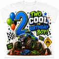 A white short-sleeve t-shirt featuring a colorful graphic design for a 'Two Cool I'm Birthday Boy!' theme. The graphic includes a large blue number 2, a blue monster truck with green rims, race cars, balloons, and various themed stickers and signs.