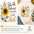 A cream graphic T-shirt shown in a styled flat-lay with blue jeans, a sunflower illustration, and the motivational quote 'She believed she could so she did' in black and gold lettering. A branded banner at the bottom reads 'Liss Print Studio'.