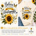 A graphic design featuring the motivational quote 'Believe In Yourself And YOU WILL BE Unstoppable' in black script with a gold banner, surrounded by bright yellow sunflowers, green leaves, and butterflies. The left side shows the full digital design, while the right side shows it printed on a cream-colored t-shirt in a styled flat-lay with jeans and a sunflower.