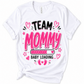 A white short-sleeve crewneck t-shirt with a graphic print that reads 'TEAM MOMMY BABY LOADING.