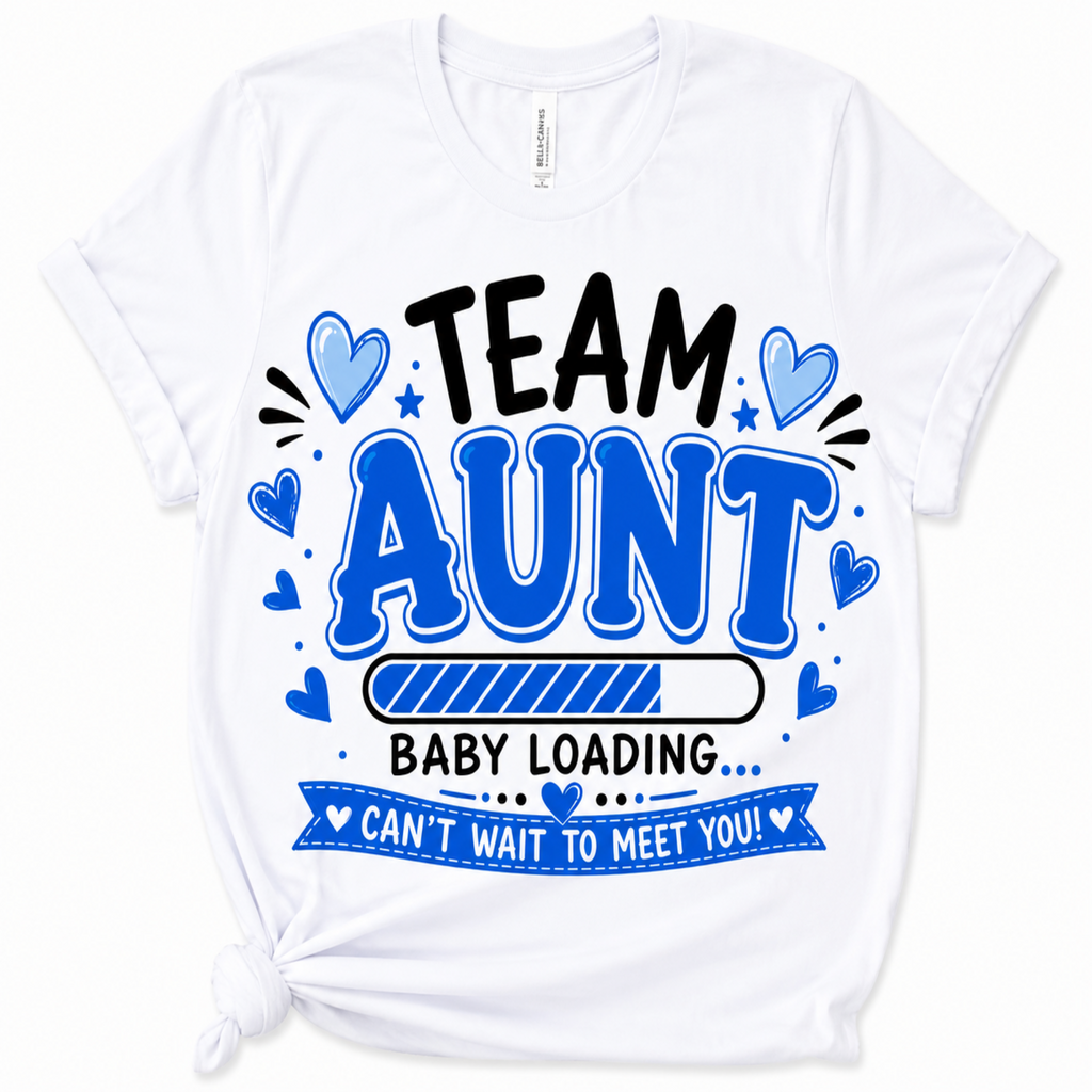 White short-sleeve crewneck T-shirt with a graphic print reading 'TEAM AUNT BABY LOADING CAN'T WAIT TO MEET YOU!' in black and blue text with heart and star accents, shown on a plain white background.