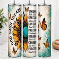 Three views of a tall insulated tumbler with a clear lid, featuring a distressed cream background, a large yellow sunflower, teal splatter accents, black text, and orange butterflies. The left view reads 'GOOD SAYS YOU ARE', the center shows a teal circle and scripture text, and the right shows more black text with orange butterflies.