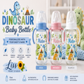 Three personalized dinosaur-themed baby bottles shown side by side on a promotional graphic background. The bottles have clear glass bodies with colorful printed dinosaur illustrations, palm trees, and names 'Mates' and 'Nino' on the front.