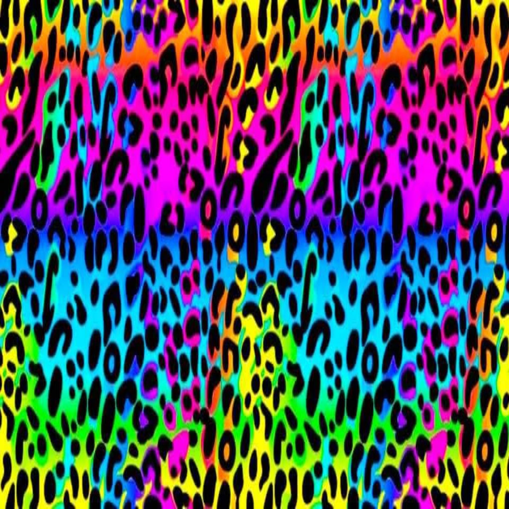 Vibrant neon rainbow leopard print pattern with black spots over bright pink, blue, green, yellow, and orange background.