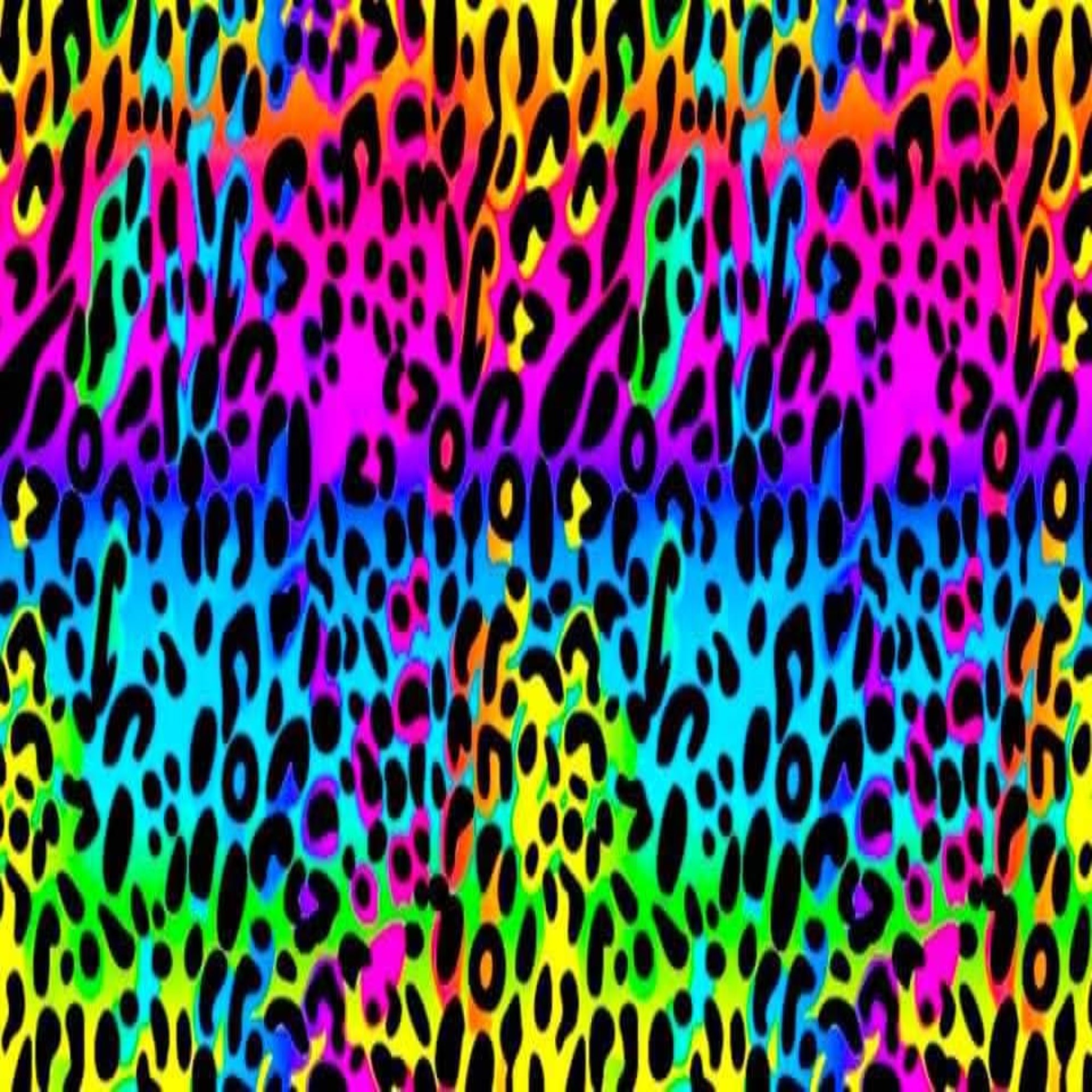 Vibrant neon rainbow leopard print pattern with black spots over bright pink, blue, green, yellow, and orange background.