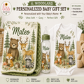 Personalized woodland-themed baby gift set including a minky blanket, glass baby bottle, and white onesie, all printed with a forest illustration featuring a bear, deer, fox, raccoon, hedgehog, and the name Mateo. The image shows the products arranged on a light background with promotional text and a small teddy bear prop.