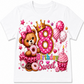A white short-sleeve kids' t-shirt featuring a colorful 8th birthday graphic with a teddy bear, donuts, balloons, a crown, cupcakes, and the words 'Birthday Sweet'.