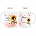 Front and back views of a white ceramic mug with a pink watercolor design, featuring a yellow sunflower and inspirational text. The left side shows 'Lisette YOU GOT THIS' and the right side shows 'BE Stronger THAN YOUR Excuses'.
