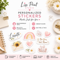 A styled flat-lay of personalized vinyl stickers from Liss Print Studio, featuring watercolor designs like a rainbow, pink hearts, crystals, a sunflower, and text stickers such as 'Lisette' and 'Be You, Not Them' on a white background with decorative stationery props.